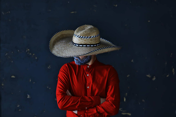 man in a hat with straw brim, hides his face, incognito guy, abstract country music style america west - Photo, image
