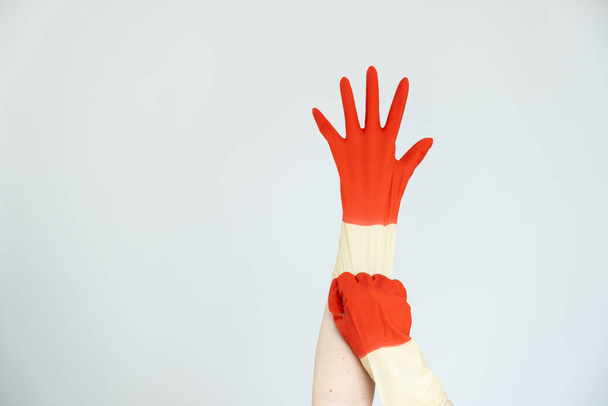 Hands put on business gloves. - 写真・画像
