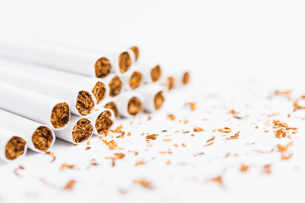 31 May of World No Tobacco Day, Close up front stack pile cigarette or tobacco on white background with copy space, Warning lung health concept - Φωτογραφία, εικόνα