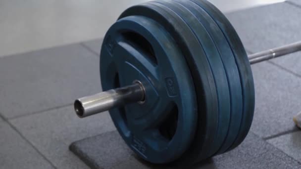 Large barbell with discs in the gym. - Footage, Video