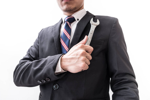 businessman with a wrench - 写真・画像