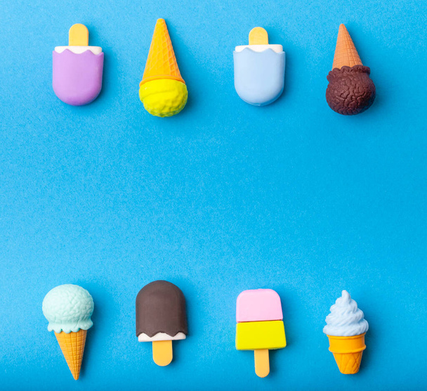 miniature Ice cream on a colorful background. Copy space. Vivid colors - Photo, Image