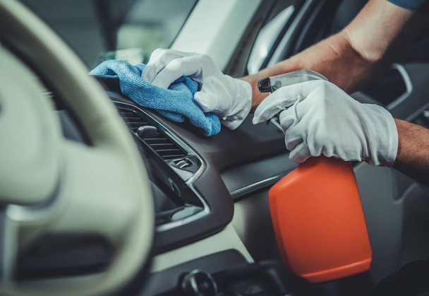 Transportation Industry. Car Interior Cleaning and Maintenance Using Specialized Cleaning and Sanitizing Detergents.  - Photo, Image