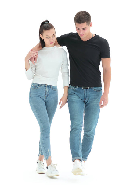 in full growth. casual young couple walking together - Foto, imagen