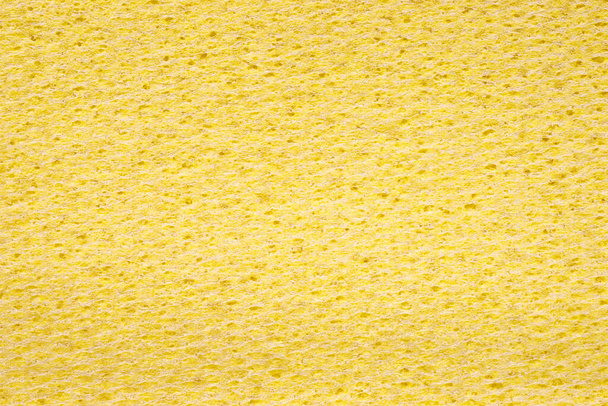 Yellow sponge close up. Background and texture - Фото, изображение