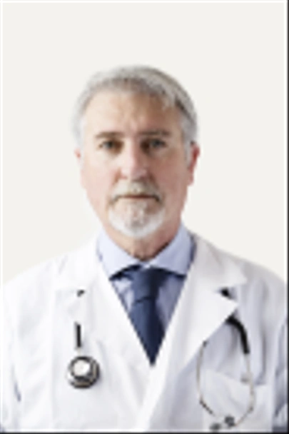 Portrait of a senior doctor against white background - 写真・画像