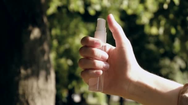 hand splashes disinfector close up footage - Video, Çekim