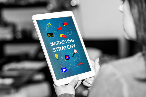 Tablet screen displaying a marketing strategy concept - Fotoğraf, Görsel