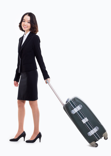Cheerful businesswomen with travel bag - Zdjęcie, obraz
