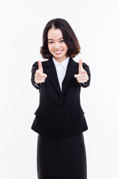Young business woman pointing you - Foto, afbeelding
