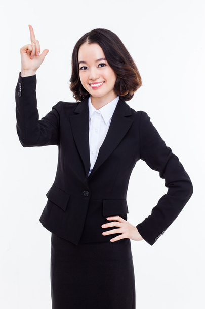 Young business woman point up side - Photo, Image