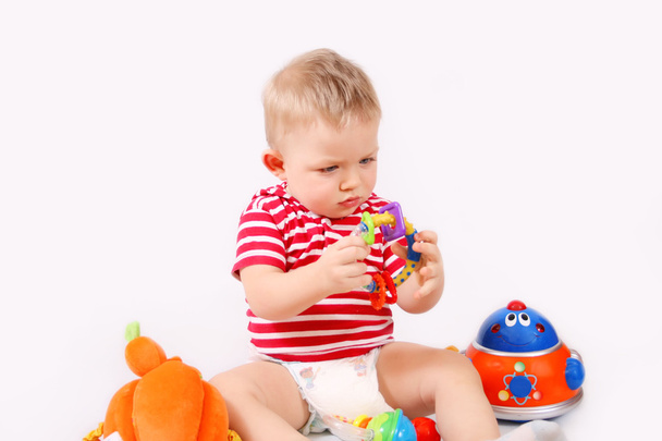 Child playing toys - Фото, изображение