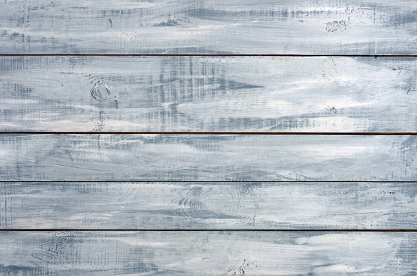 Background from wooden boards with white and blue stains. Abstract background. - Zdjęcie, obraz