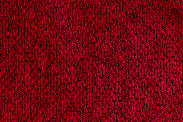 Koyu kırmızı, bordo örülmüş kumaş. Sert süveter arka planı - Fotoğraf, Görsel