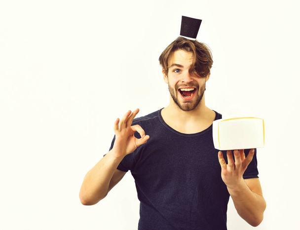 Caucasian sexy young macho holding male box with coffee cup - Fotografie, Obrázek