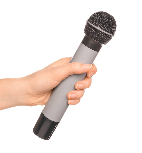 Hand met microfoon op witte achtergrond - Foto, afbeelding