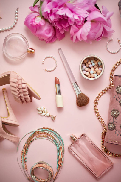 Beauty and fashion accessories and gadgets. Femine concept. Flat lay on pink theme background - Photo, Image