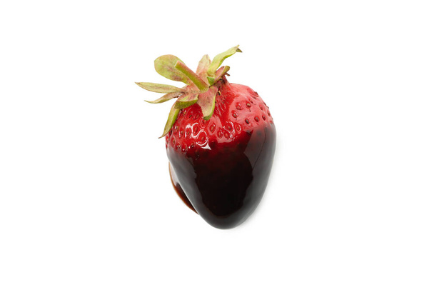 Chocolate fondue. Strawberry in chocolate sauce isolated on white background - Фото, зображення