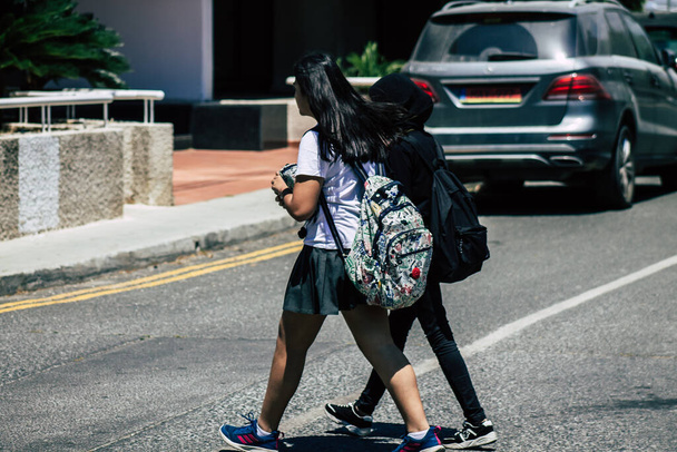 Limassol Cyprus May 29, 2020 View of unidentified teens walking in the streets of Limassol in Cyprus island - Photo, Image