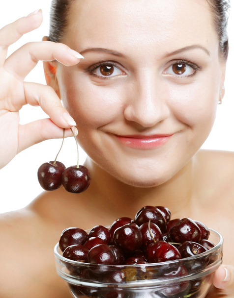 Woman with cherries over white - Fotoğraf, Görsel