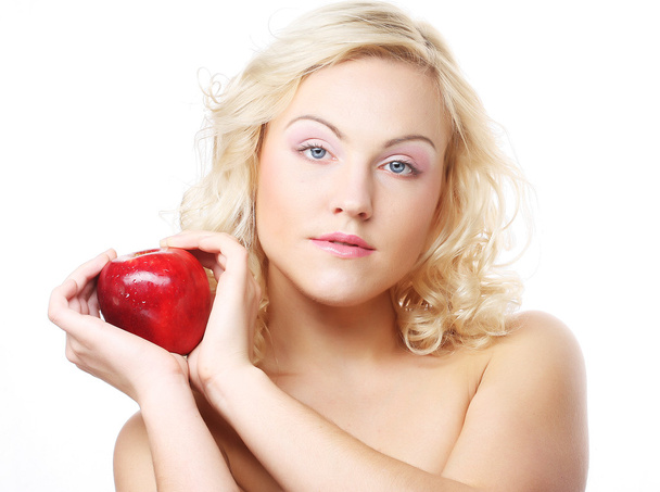 Smiling woman with red apple - Foto, Imagen
