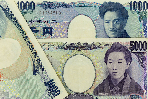 Billets de monnaie répartis à travers le cadre yen japonais en différentes coupures
 - Photo, image