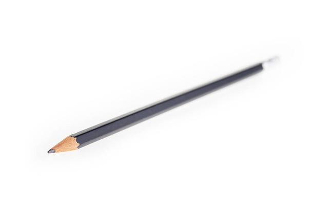 クローズアップビュー、黒の木製の鉛筆、白い背景に隔離された - 写真・画像