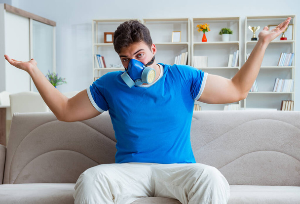 Man sweating excessively smelling bad at home - Fotografie, Obrázek