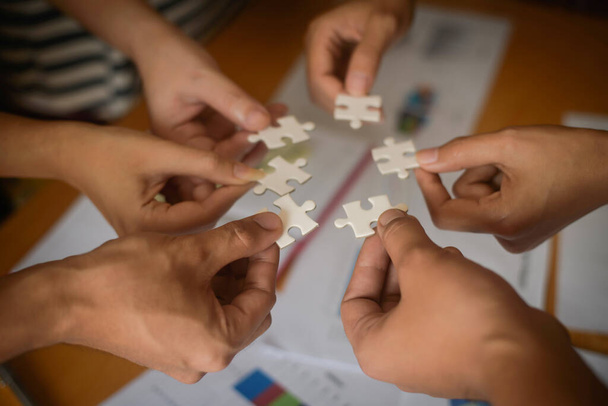 Hand holding jigsaw puzzles, Business partnership concept. - Photo, Image