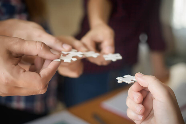 Hand holding jigsaw puzzles, Business partnership concept. - Photo, Image
