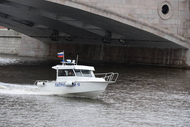 MOSCOW, RUSSIA - MAY 9, 2020:Patrol boat of the Central Directorate of State River Supervision on the Moscow River - 写真・画像