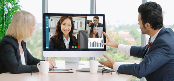 Video call group business people meeting on virtual workplace or remote office. Telework conference call using smart video technology to communicate colleague in professional corporate business. - Photo, Image