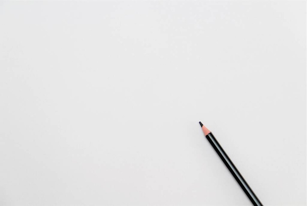 black pencil on white paper - Φωτογραφία, εικόνα