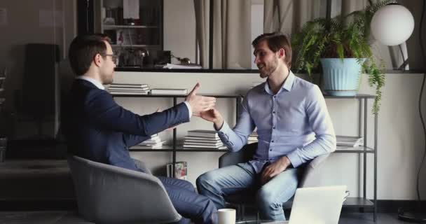 Executive manager handshaking partner making business agreement in office - Felvétel, videó