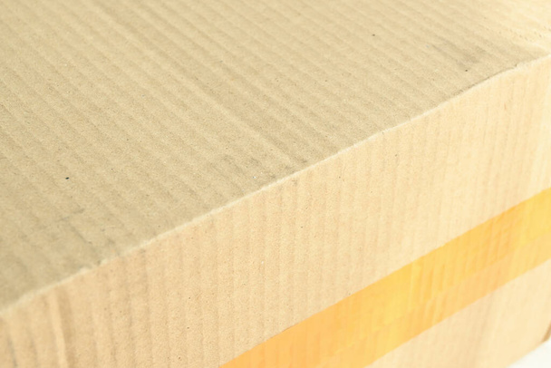 καφέ χάρτινο κουτί κουτί κουτί με συσκευασία ραβδί ταινία ουίσκι - Φωτογραφία, εικόνα