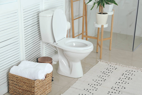Stylish toilet bowl in modern bathroom interior - Zdjęcie, obraz