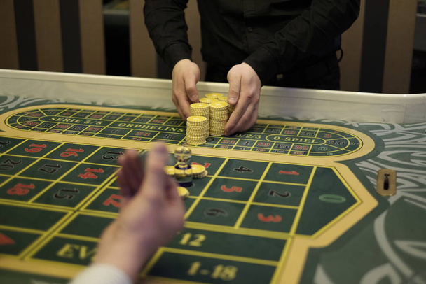 gambling roulette, casino interior, big winnings, luxury roulette table - Foto, immagini