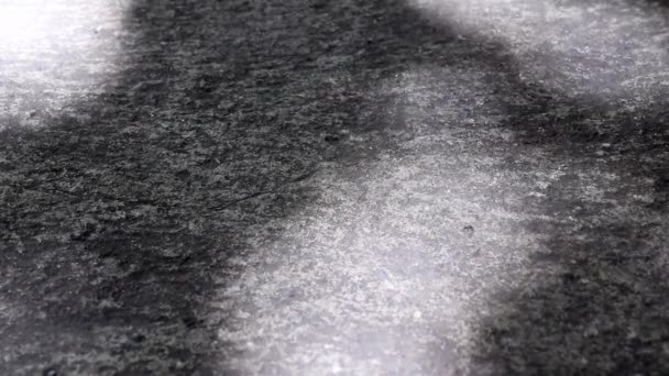 Beautifully moving abstract sunlight and shadow of tree leaves on concrete ground surface. - Footage, Video