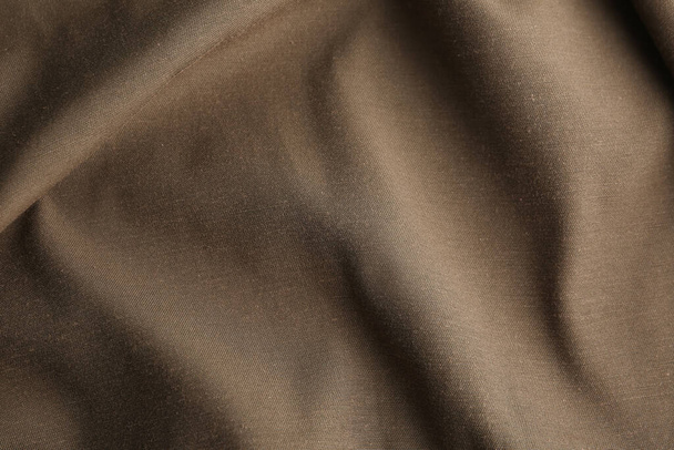 Texture of beautiful brown fabric as background, closeup - Фото, изображение