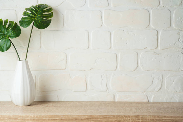 Wooden shelf background with home decor vase. - Zdjęcie, obraz