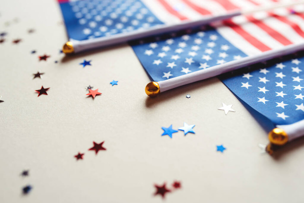 Festive background with US flags and confetti. - Фото, зображення