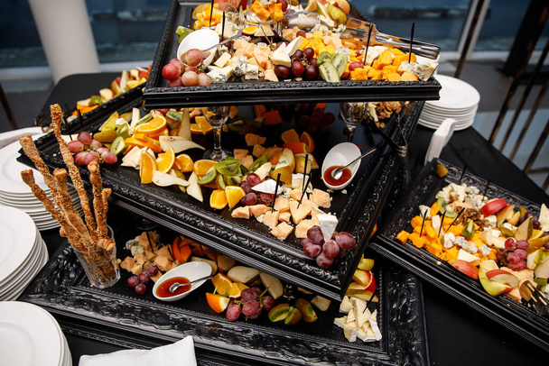 Gourmet appetizers, catering at the event, Different snacks on the table. - Photo, Image