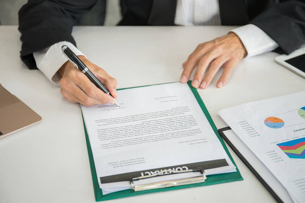 Businessman is signing a partnership contract, Business connection concept. - Fotó, kép