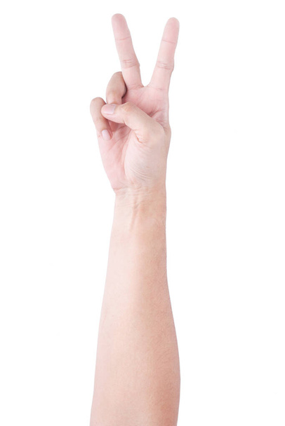 Mužské asijské gesta rukou izolované přes bílé pozadí. Dva prsty Akce. Victory Pose. - Fotografie, Obrázek