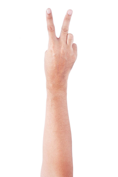 Männliche asiatische Handgesten isoliert über dem weißen Hintergrund. Zwei Finger Aktion. Siegerpose. - Foto, Bild