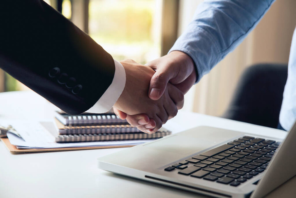 Close up of handshake.business people shaking hands, finishing up meeting - Фото, зображення