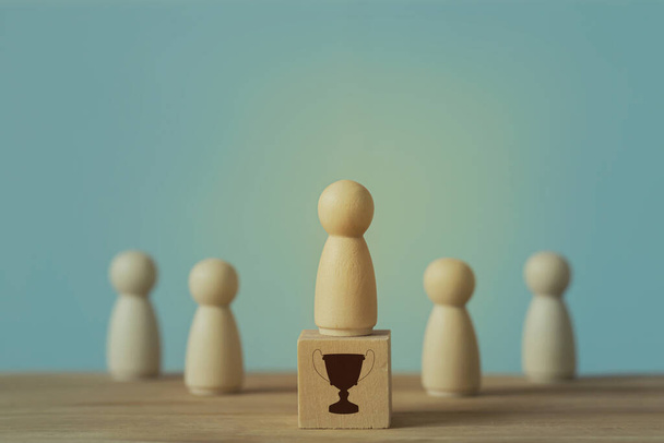 Successful business team leader concept: Businessman standing at the highest point on wooden block stand out from the crowd. depicts of career growth up or business success. - Photo, Image