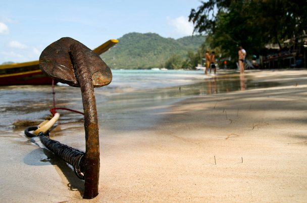 Boat Anchor Stuck in the yellow sand beach in Koh Phangan Thailand - Photo, Image