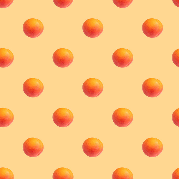 Seamless pattern with apricots on an orange background. Minimal isometric texture of food. Use for boards, print on fabric. View from above. - Photo, Image