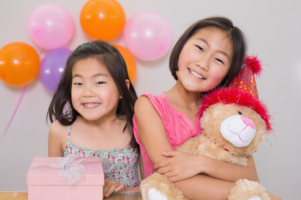 Cute little girls at a birthday party - Foto, imagen